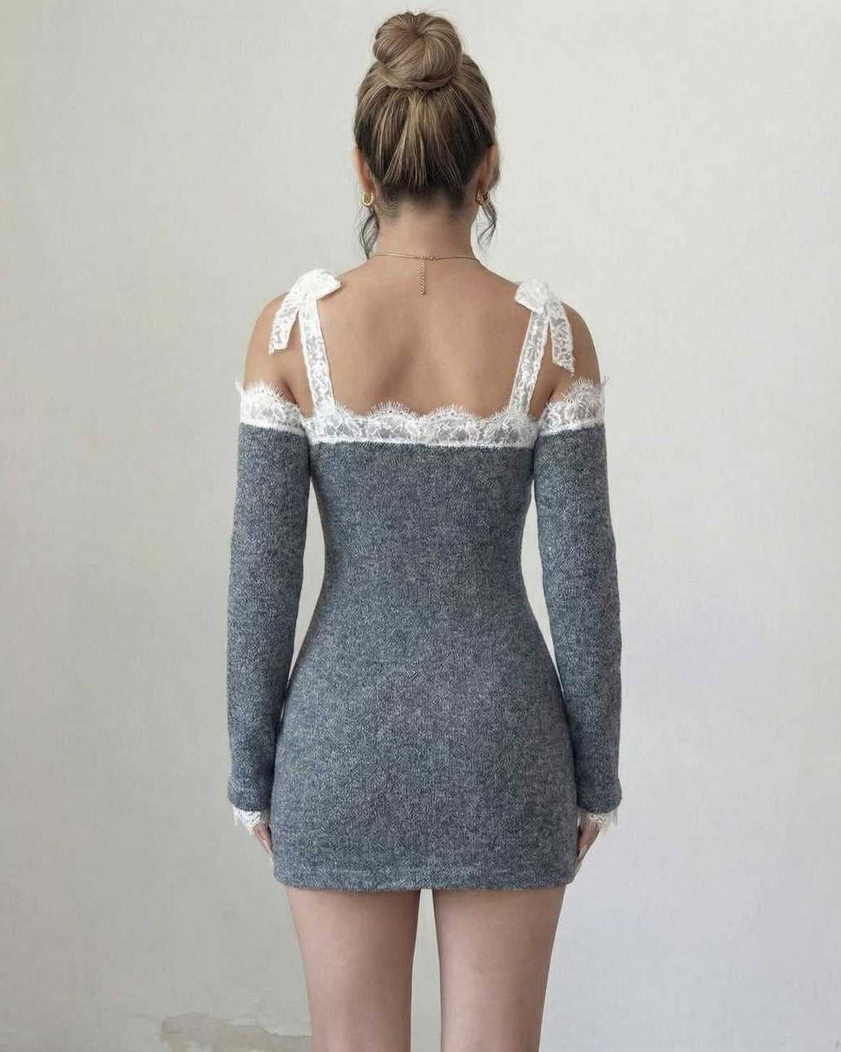 Celestine Mini Dress by Lauven - Women’s grey bodycon mini dress with lace trim and long sleeves, back view.