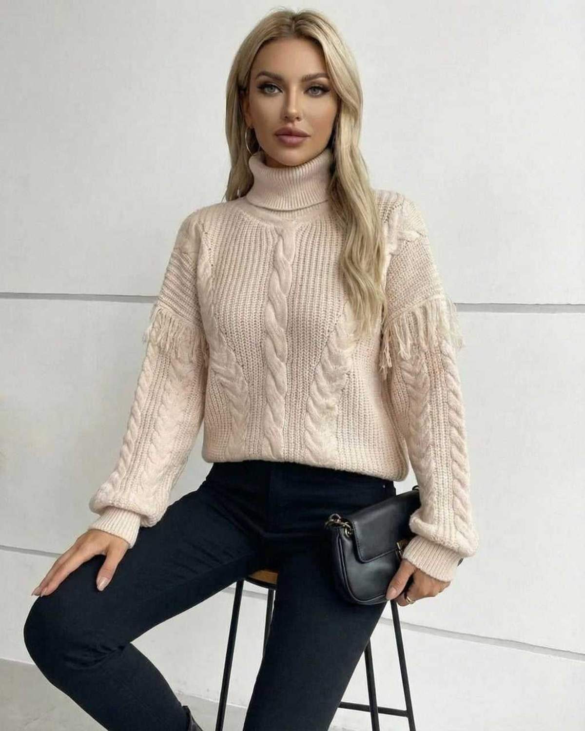 Women’s Beige Turtleneck Vienna Sweater by Lauven, showcasing cable knit design and fringe detail, perfect for fall winter.