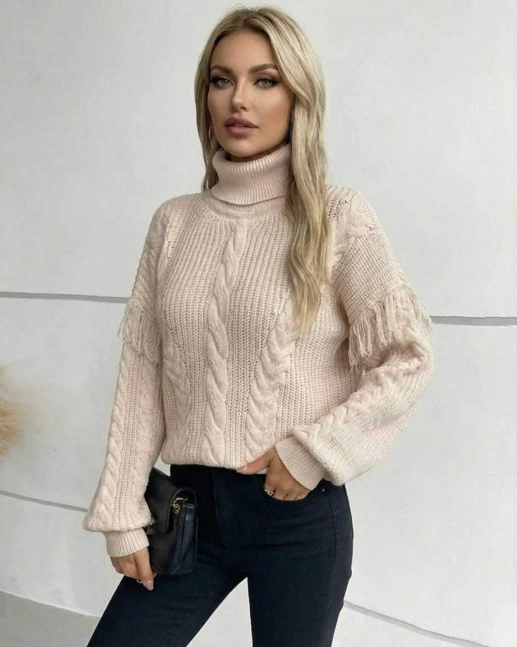 Vienna Sweater by Lauven – Women’s beige cable knit turtleneck sweater with fringe detailing for fall winter.