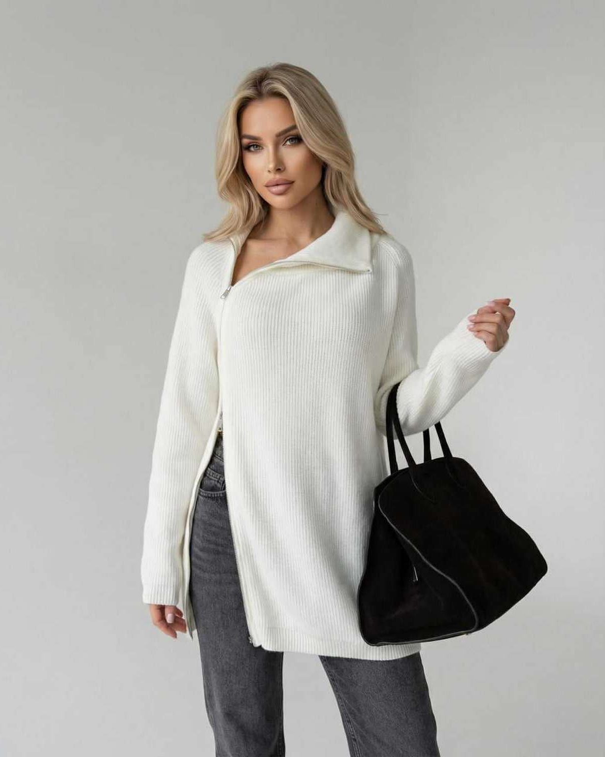 Women’s white Aspen Sweater by Lauven, featuring long sleeves and a stylish zip design.