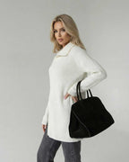 Aspen Sweater - Women’s White Turtleneck Sweater by Lauven, featuring a loose fit and long sleeves.