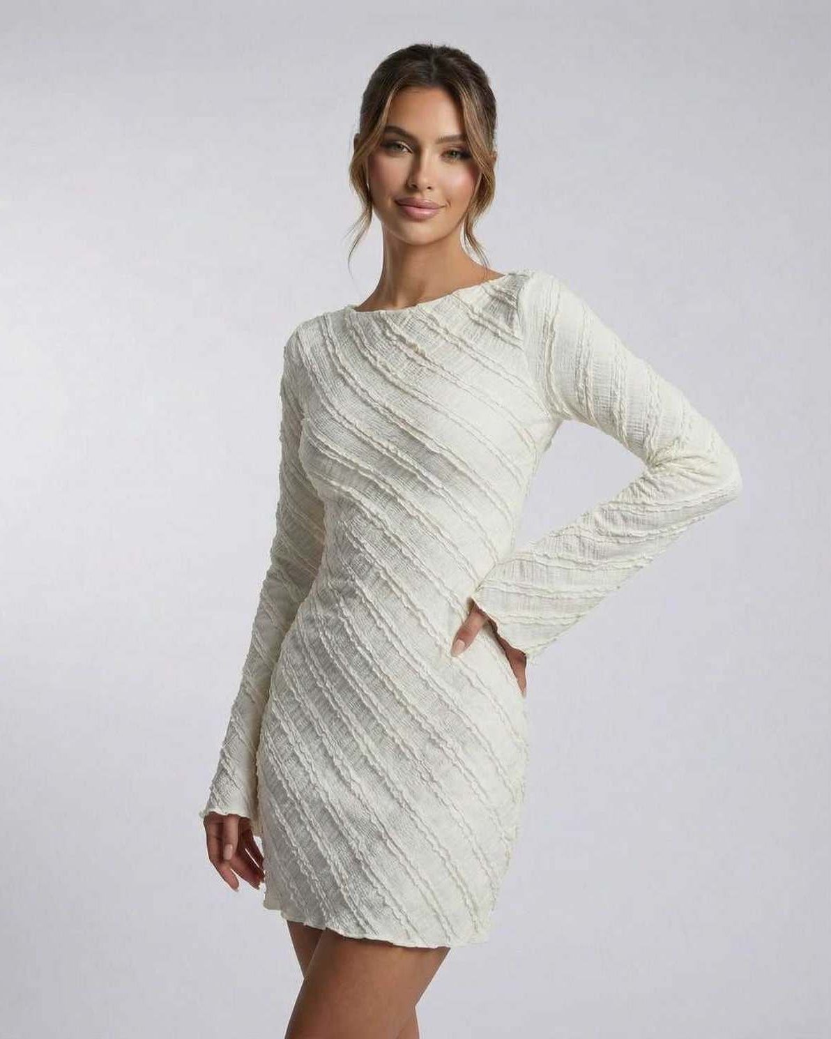 Sienna Mini Dress by Lauven - White long sleeve A-line dress with textured finish and structured drape.