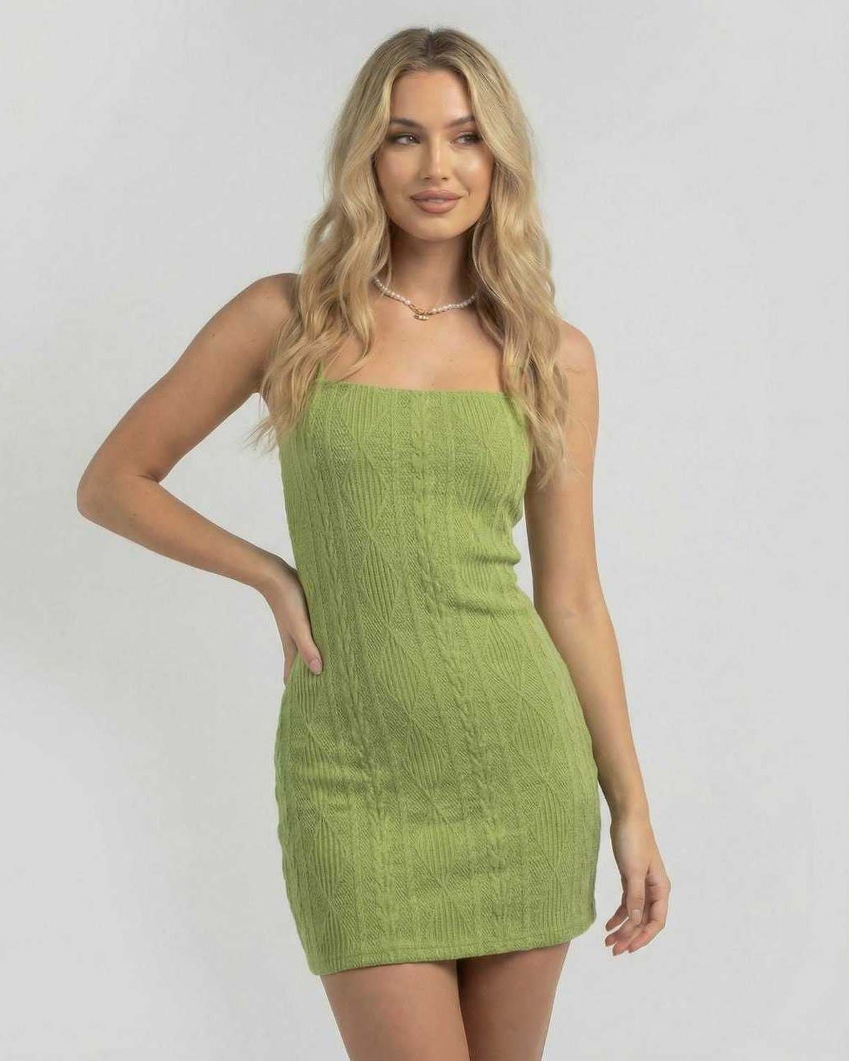 Verona Mini Dress by Lauven – Green bodycon mini dress with open back and textured finish.