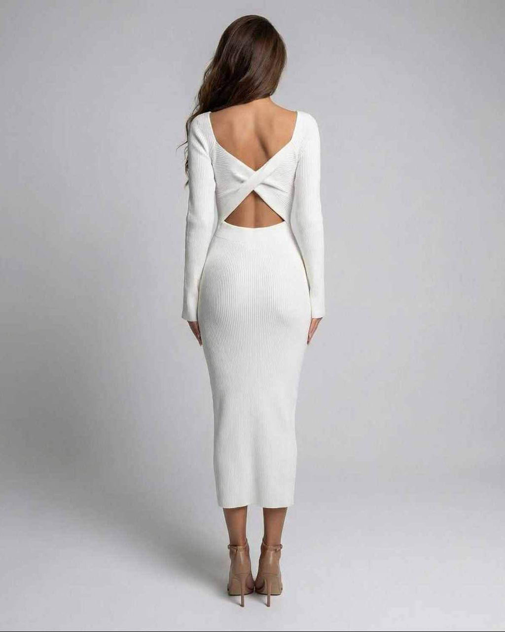 Back view of Sienna Midi Dress by Lauven, showcasing the elegant cut out detail and bodycon silhouette.