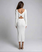 Back view of Sienna Midi Dress by Lauven, showcasing the elegant cut out detail and bodycon silhouette.