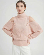 Valencia Sweater by Lauven – Women’s wool turtleneck sweater with cold shoulder detail in soft pink.