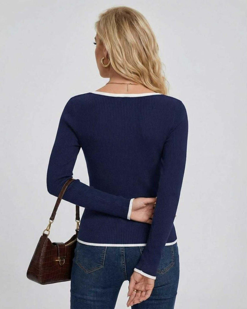 Back view of a woman wearing the Milano Sweater by Lauven, a navy V neck slim fit sweater.