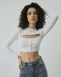 Monaco Top by Lauven - Women's white long sleeve cut out top in ribbed knit, showcasing a modern and versatile design.
