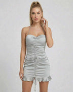 Celeste Mini Dress by Lauven in sleek satin finish with ruched design and high-waist silhouette.