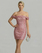 Aurora Mini Dress by Lauven, a pink sequin bodycon mini dress with off-shoulder design.