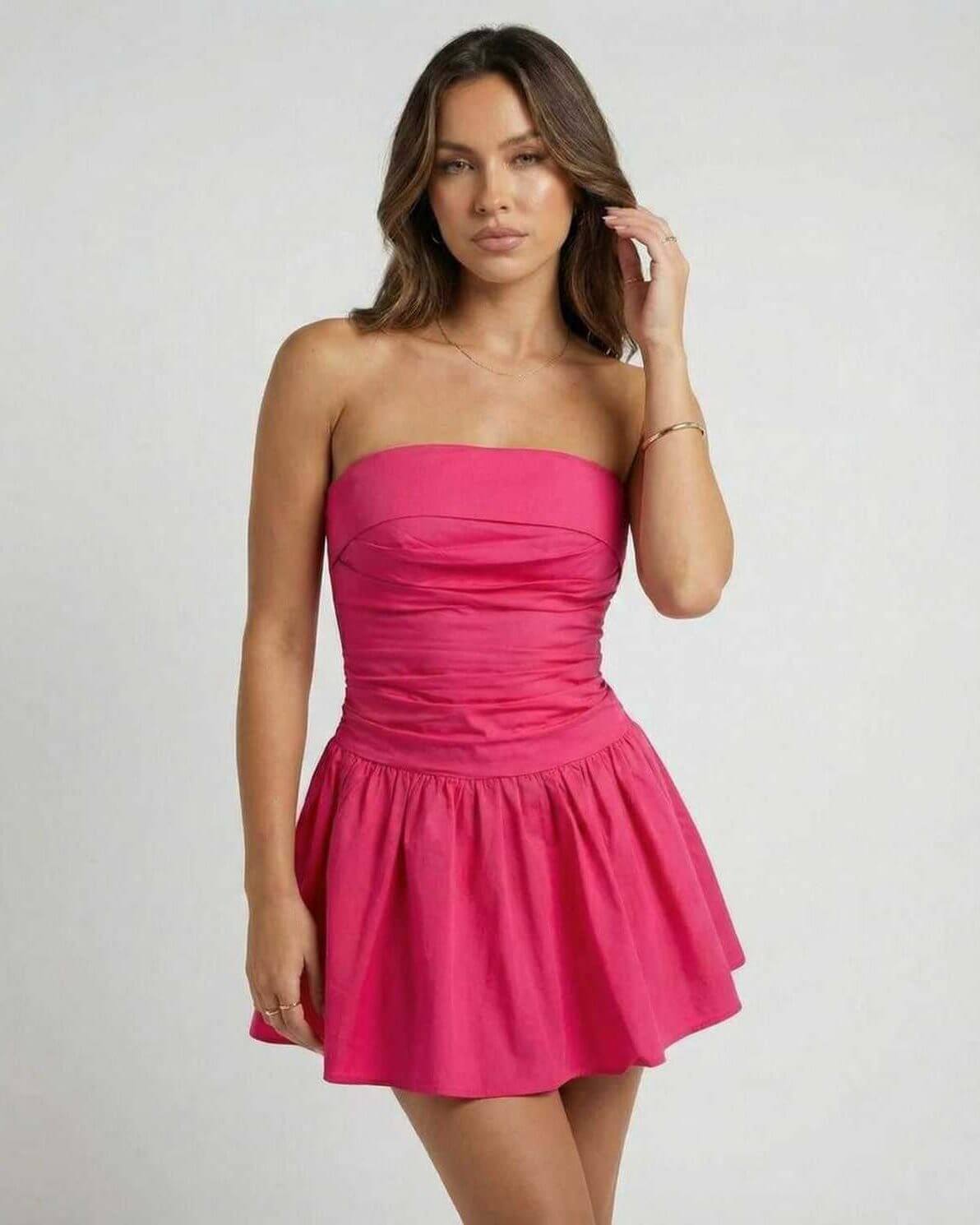 Azalea Mini Dress by Lauven – Vibrant pink strapless A-line silhouette perfect for summer events.