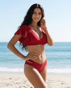 Riviera Two-Piece Swimsuit by Lauven in red, featuring deep V-neckline and flutter sleeves, perfect for beach days.