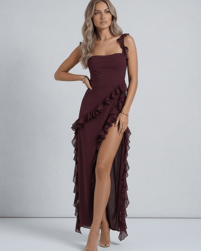 Amaranth Maxi Dress by Lauven in deep plum with ruffled shoulder straps and thigh-high side slit.