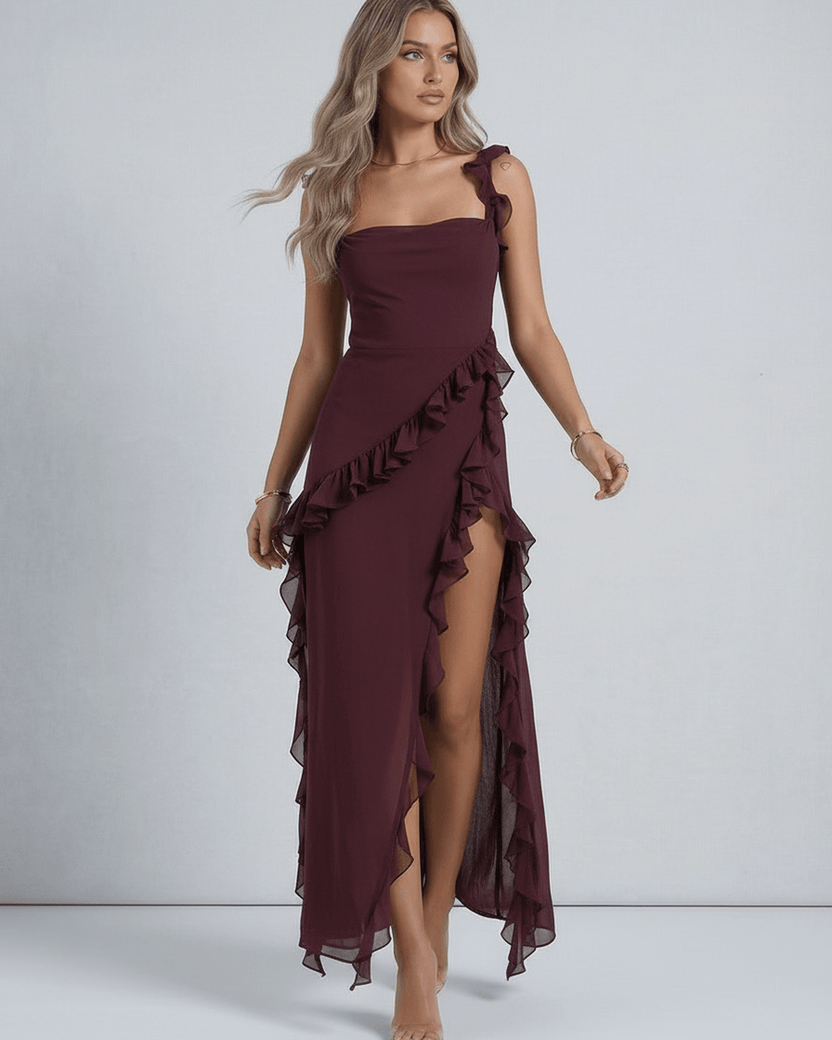 Amaranth Maxi Dress by Lauven, featuring deep plum sheer fabric, ruffled straps, and a thigh-high side slit.