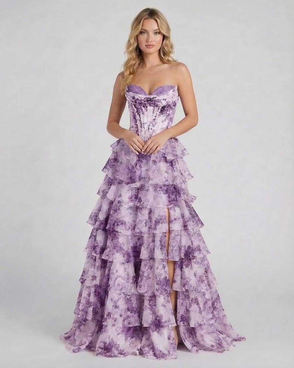 Amethyst Maxi Dress by Lauven, a stunning purple floral tiered chiffon prom dress with a strapless corset bodice.