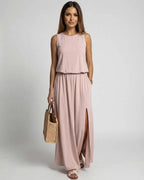 Arden Maxi Dress blush pink sleeveless silhouette and side slit by Lauven for an elegant summer look.