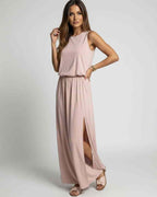 Arden Maxi Dress in blush pink, featuring sleeveless design and side slit, by Lauven for sleek, effortless style.