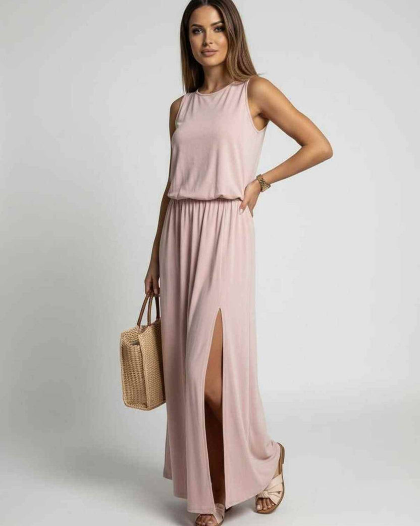 Arden Maxi Dress in blush pink, sleeveless with side slit, by Lauven, featuring a relaxed silhouette and elegant design.