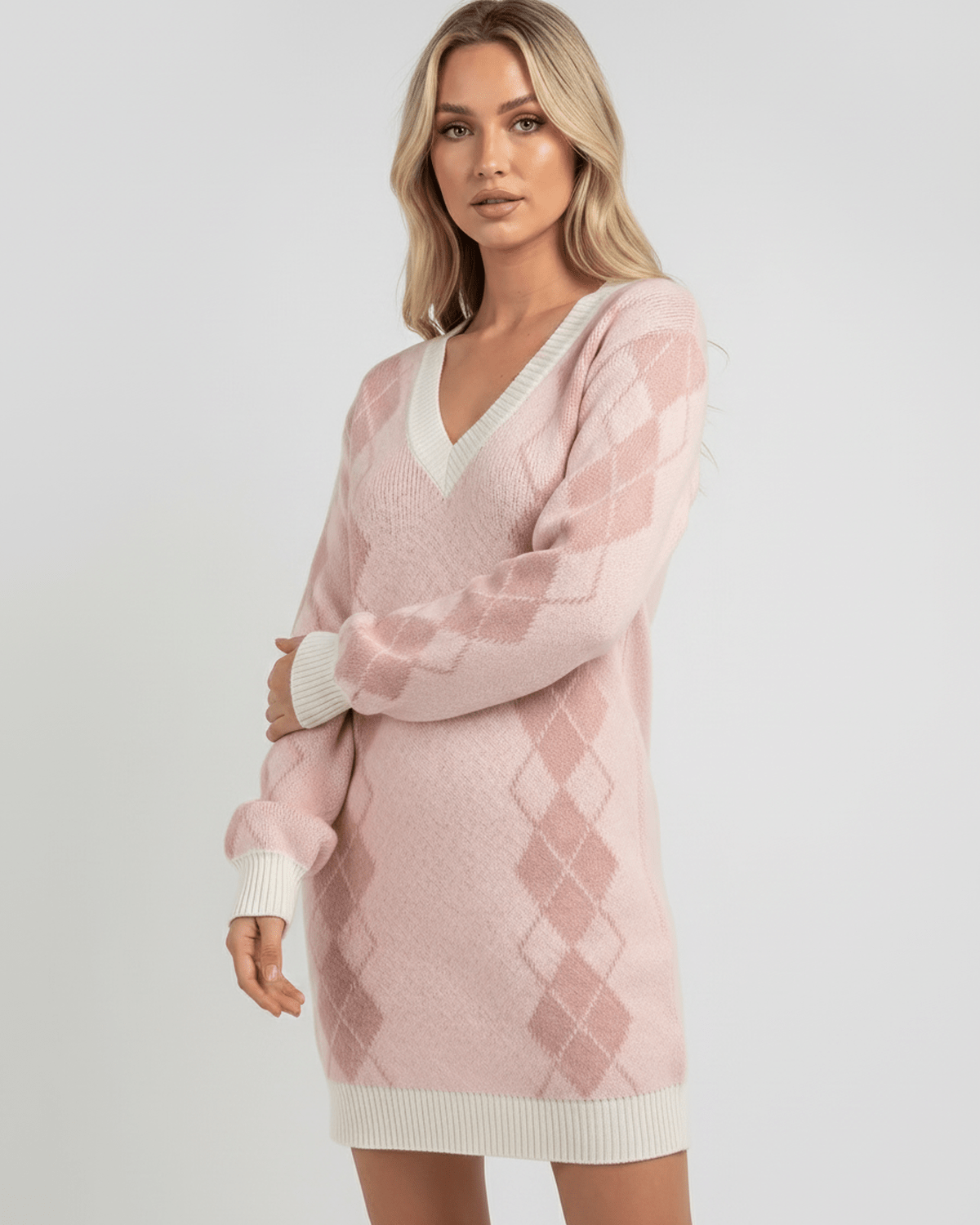 Arden Mini Dress by Lauven, features acrylic knit, cozy texture, and V-neck with argyle pattern for modern comfort.
