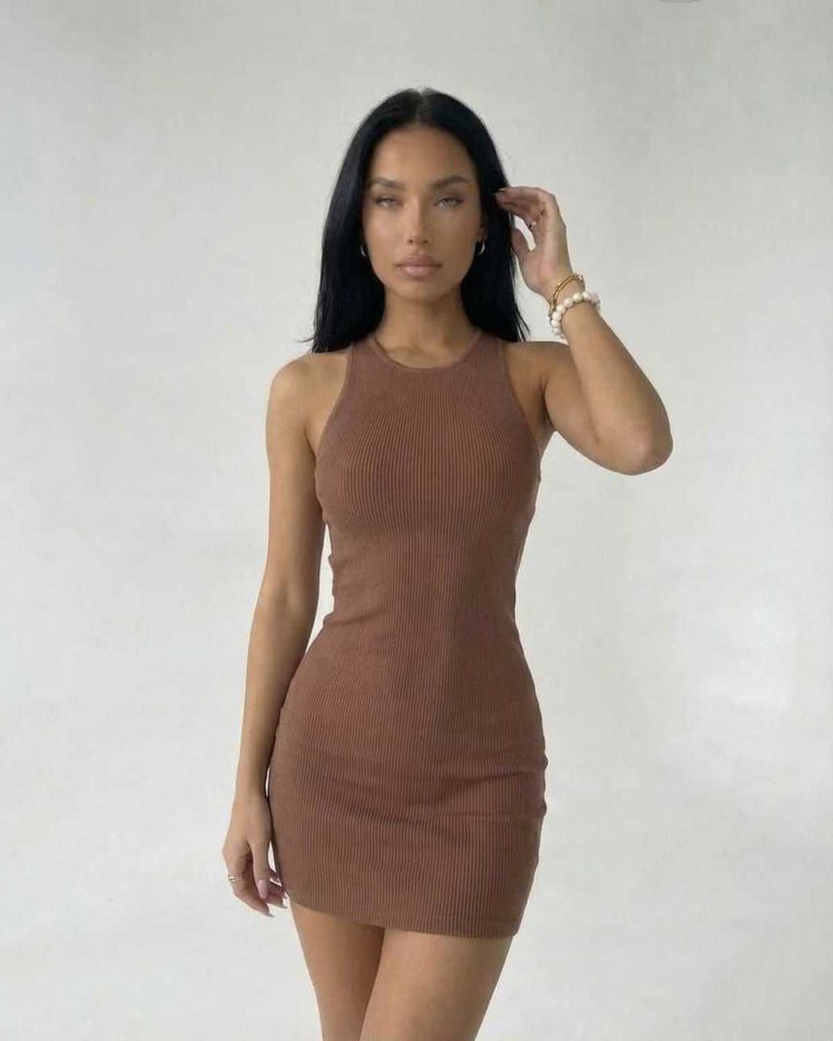 Arden Mini Dress by Lauven, brown ribbed knit sleeveless bodycon style, showcasing modern minimalism.