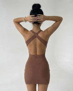 Arden Mini Dress by Lauven featuring a back view of a brown ribbed knit sleeveless bodycon design.
