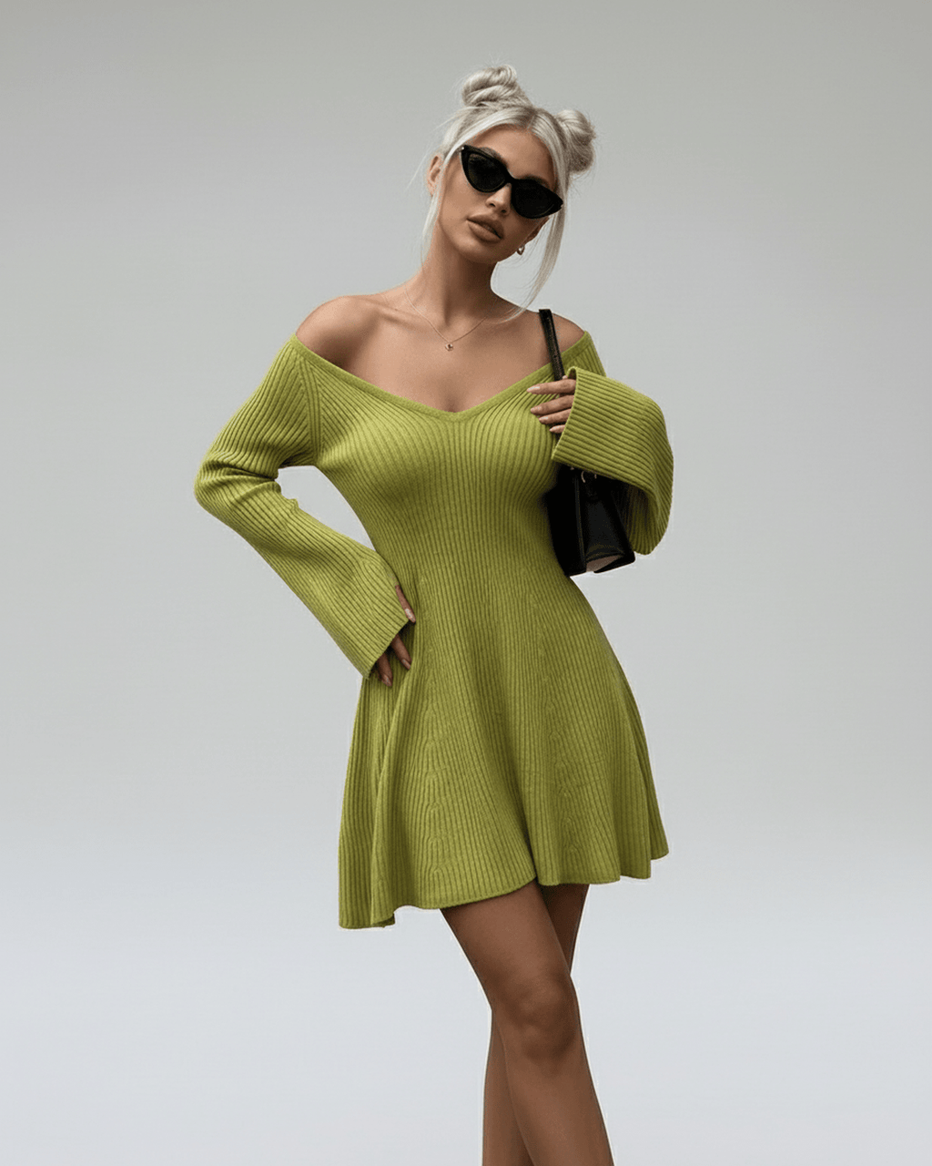 Aura Mini Dress by Lauven in slim fit green knit with V-neck and flared cuffs, perfect for stylish occasions.