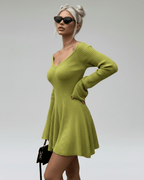 Aura Mini Dress by Lauven in slim fit green knit with V-neck and flared cuffs, perfect for modern elegance.