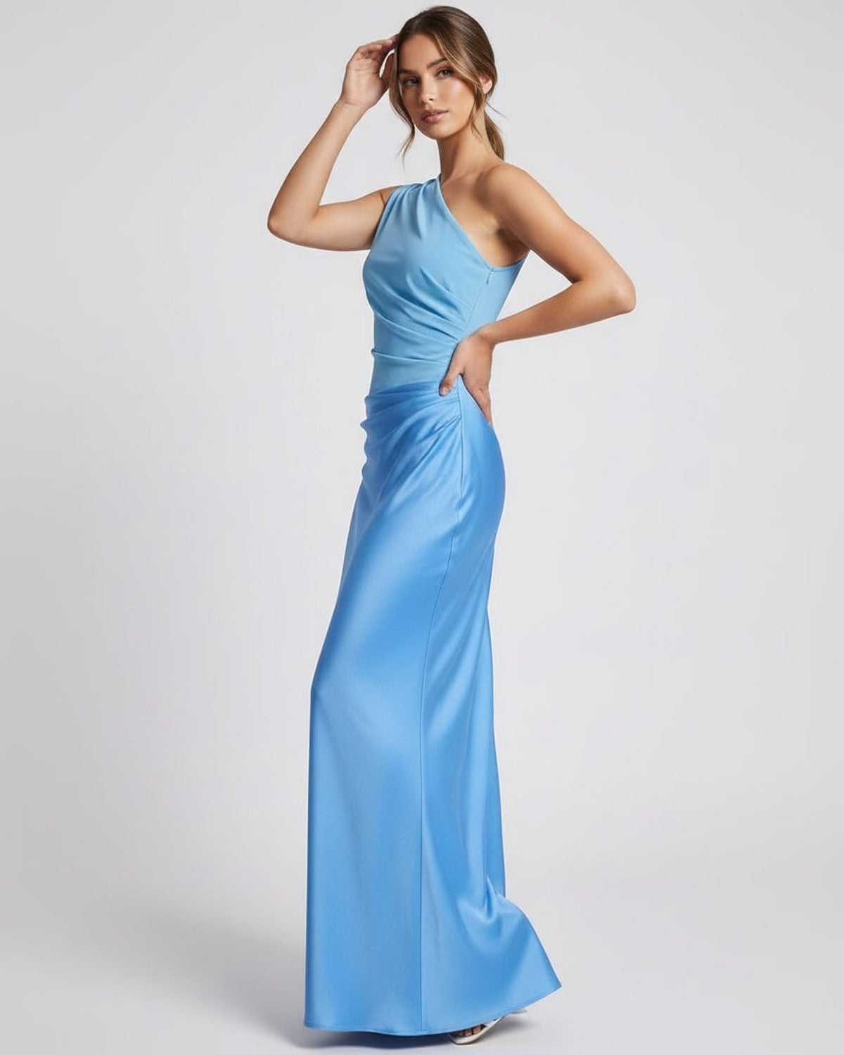 Aurelia Maxi Dress side view, blue one shoulder design with elegant drape, from Lauven brand.