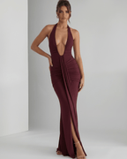 Aurelia Maxi Dress features a smooth stretch jersey fabric, halter neck, and body-skimming silhouette by Lauven.
