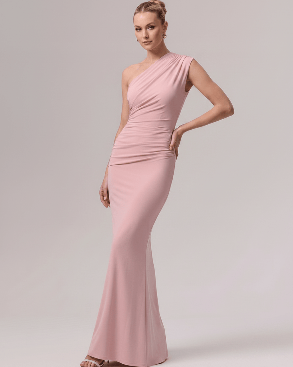 Aurelia Maxi Dress in soft pink, one-shoulder design with smooth stretch jersey, ideal for elevated occasions.