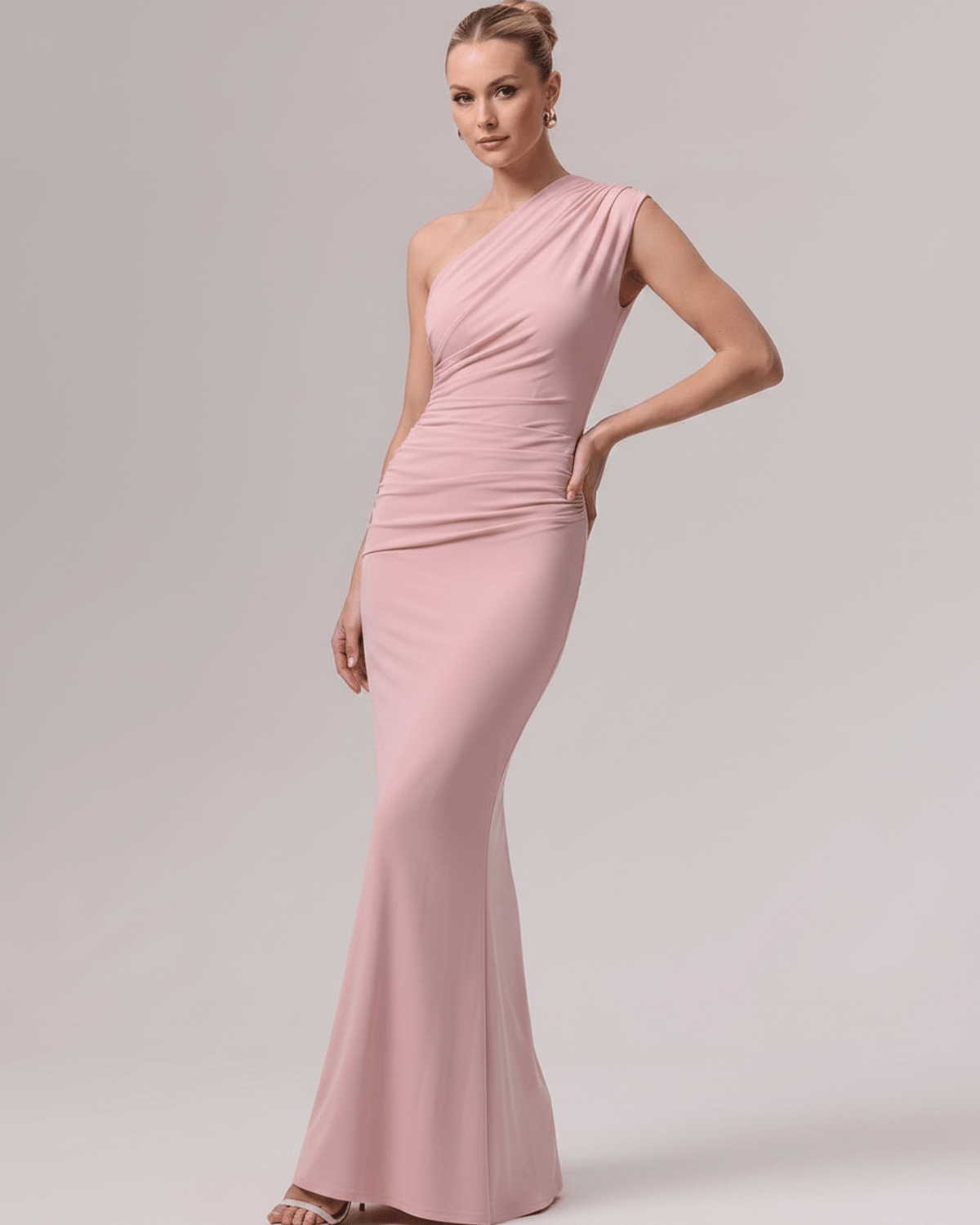 Aurelia Maxi Dress in soft pink, one-shoulder design with smooth stretch jersey, ideal for elevated occasions.