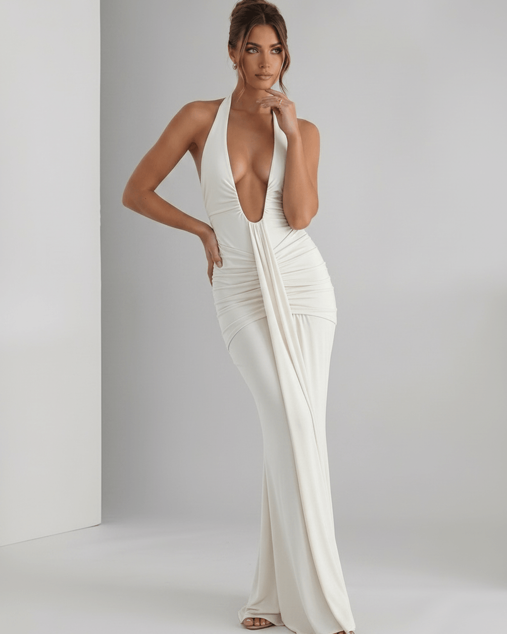 Aurelia Maxi Dress in white, featuring smooth stretch jersey, halter neck, slim fit, elegant look by Lauven.