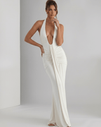 Aurelia Maxi Dress in white, featuring smooth stretch jersey, halter neck, slim fit, elegant look by Lauven.