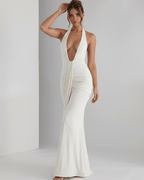 Aurelia Maxi Dress featuring a halter neck, soft stretch jersey fabric, and sleek body-skimming fit by Lauven.