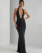 Aurelia Maxi Dress in black, featuring stretch jersey, halter neck, and flattering ruching, designed by Lauven.