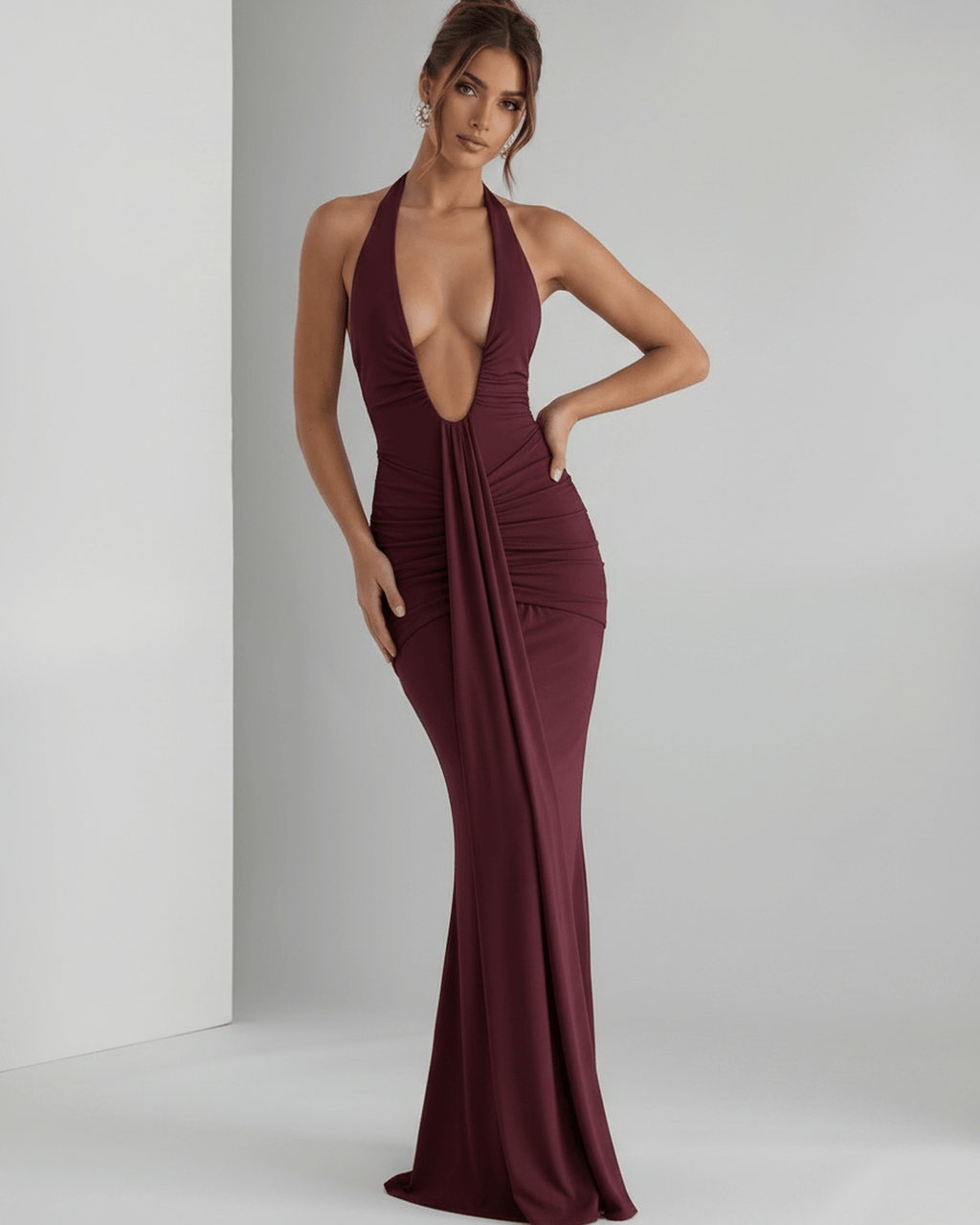Aurelia Maxi Dress in burgundy, made from smooth stretch jersey, features a halter neck, body-skim fit, and elegant ruching.
