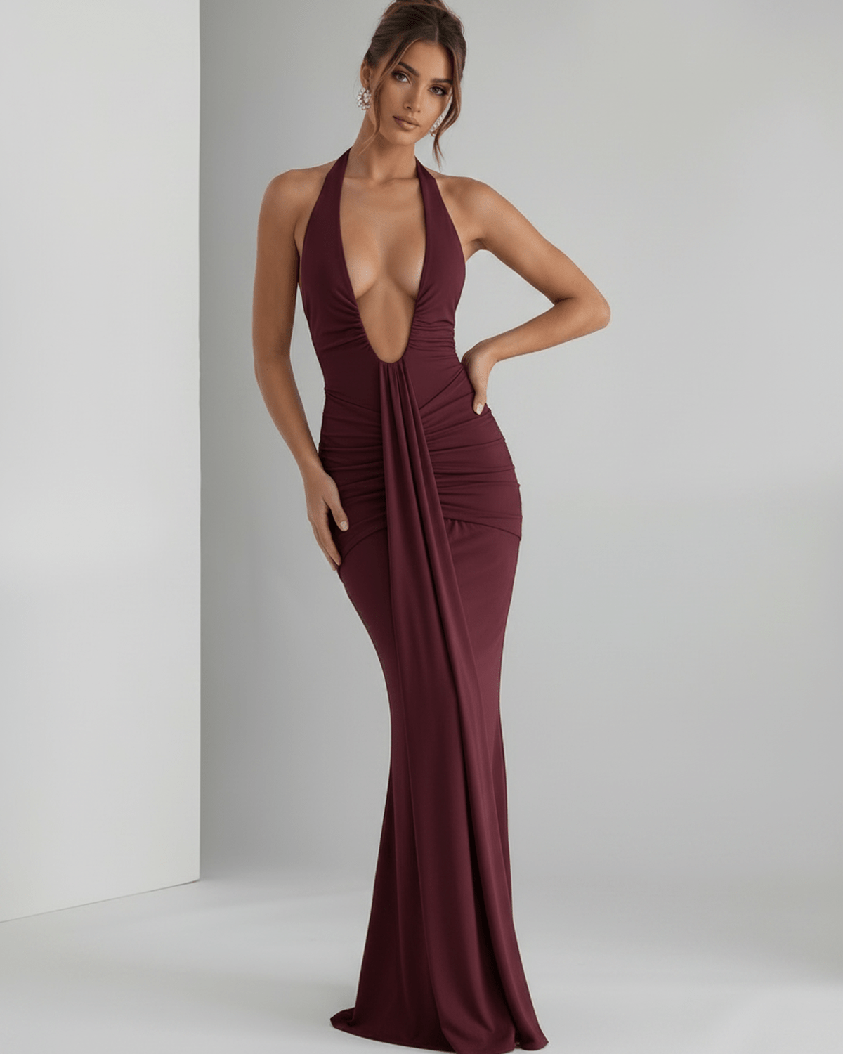 Aurelia Maxi Dress in burgundy, made from smooth stretch jersey, features a halter neck, body-skim fit, and elegant ruching.