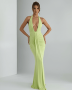 Aurelia Maxi Dress in vibrant green, featuring stretch jersey, halter neck, and subtle ruching for a modern look by Lauven.