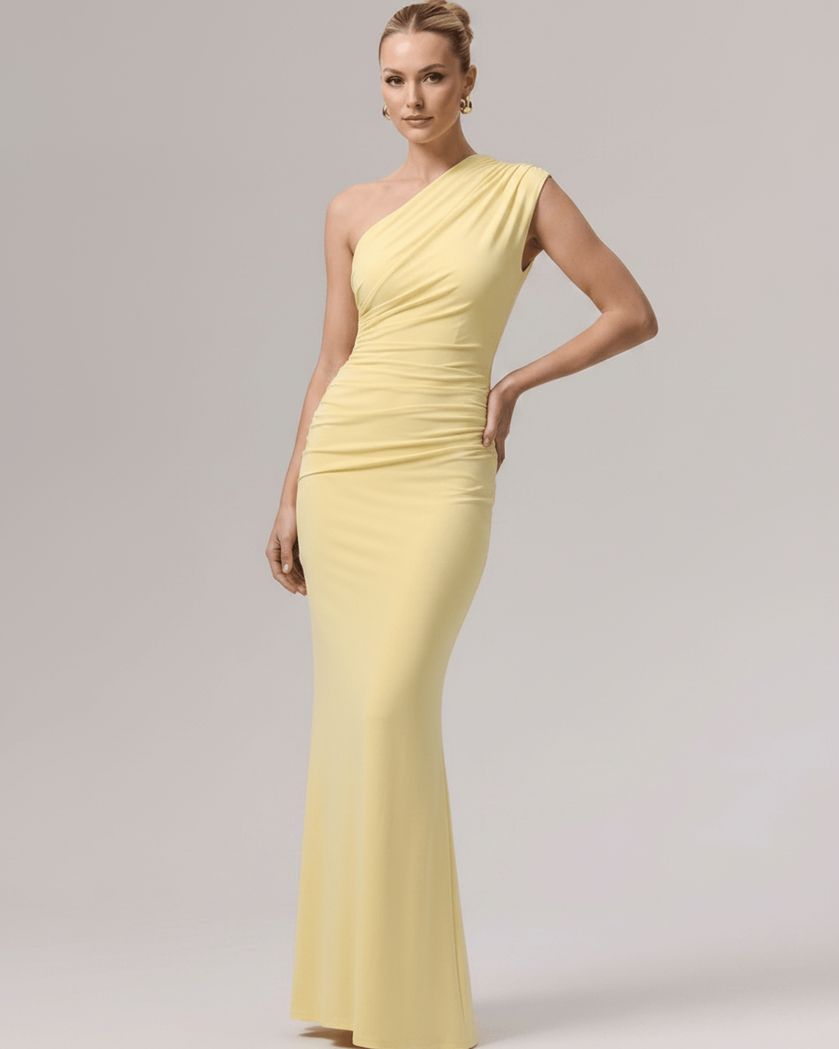 Aurelia Maxi Dress in yellow, featuring one-shoulder design and smooth stretch jersey for a modern, elegant silhouette by Lauven.