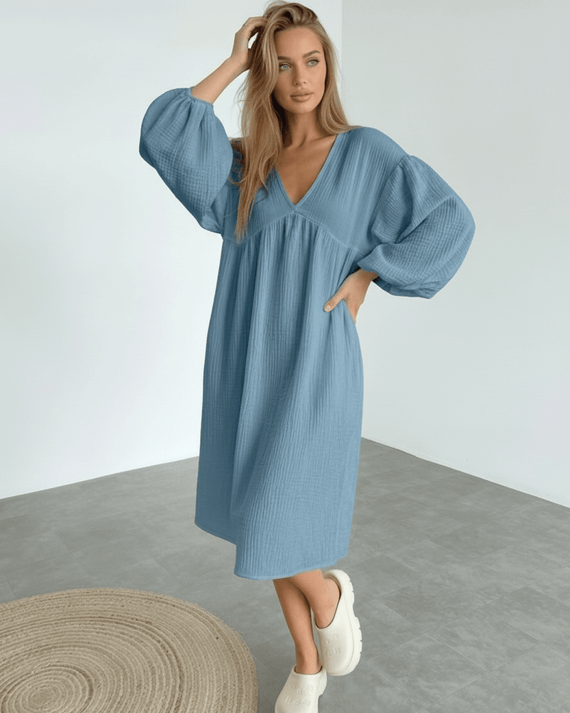 Aurelia Midi Dress in blue cotton, featuring puff sleeves and a flattering v neck, by Lauven for effortless sophistication.