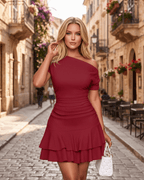 Aurelia Mini Dress featuring textured stretch fabric, asymmetrical neckline, ruched bodice, and tiered ruffle hem by Lauven.