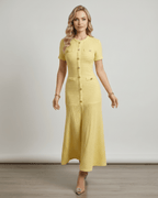 Aureline Maxi Dress in yellow, textured knit, round neck, flared hem, by Lauven for a chic and modern look.