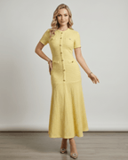 Aureline Maxi Dress in textured knit fabric, featuring a round neck and flared hem, by Lauven.