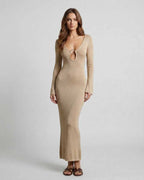 Aurora Maxi Dress by Lauven in sleek beige with deep V-neck and unique ring accent, highlighting a smooth silhouette.
