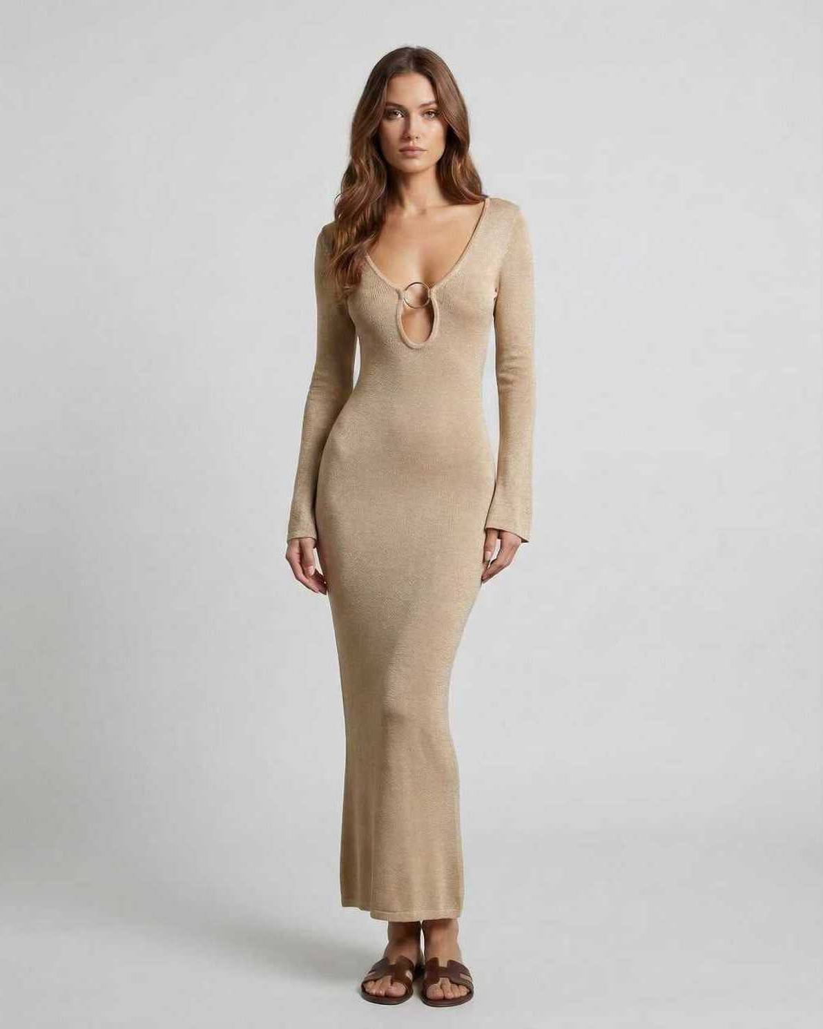 Aurora Maxi Dress by Lauven in sleek beige with deep V-neck and unique ring accent, highlighting a smooth silhouette.