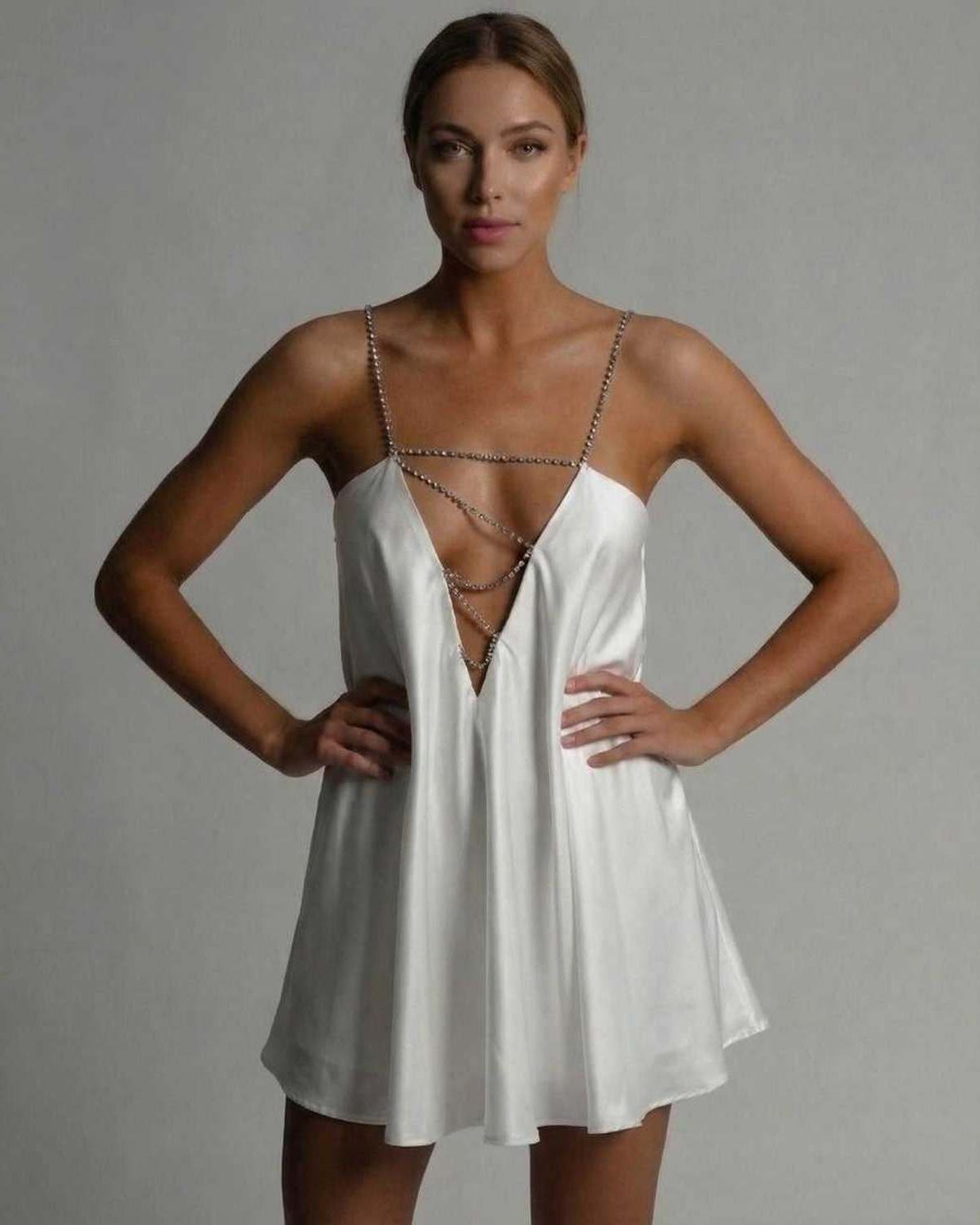Aurora Mini Dress by Lauven featuring a sleek satin finish and elegant A-line silhouette in classic white.