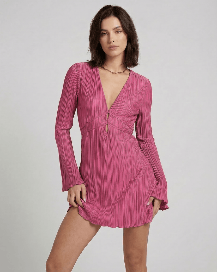 Aurora Mini Dress by Lauven in vibrant pink with pleated fabric and flared long sleeves.
