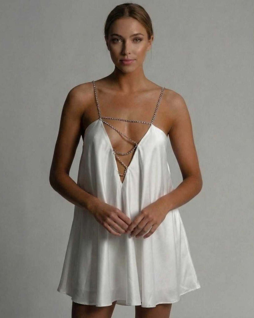 Aurora Mini Dress by Lauven featuring a satin A-line silhouette and hollow V-neckline with beaded straps.