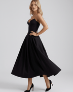 Aveline Midi Dress in black, V-neck midi dress with structured bodice, flowing skirt, by Lauven. Perfect for elegant occasions.