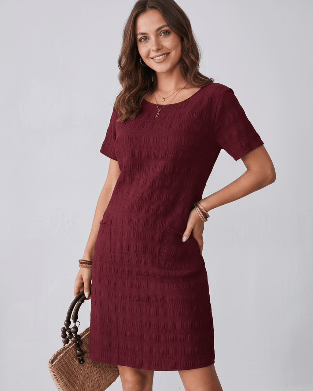 Avelin Mini Dress in textured fabric with round neckline, short sleeves, and a fresh silhouette by Lauven.